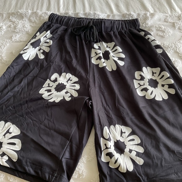 SHEIN Other - SHEIN Boys Black and White Athletic Shorts with Bold Floral Design